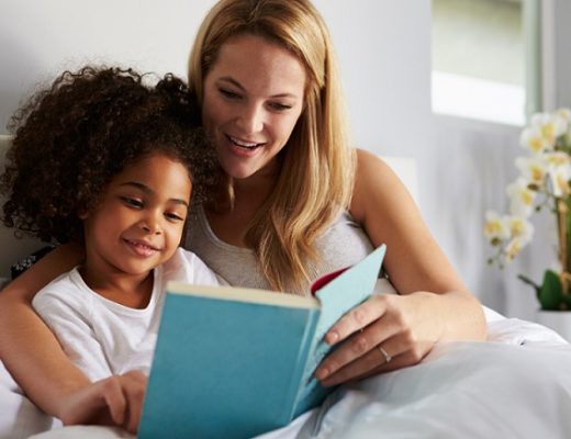 mom and daughter reading together